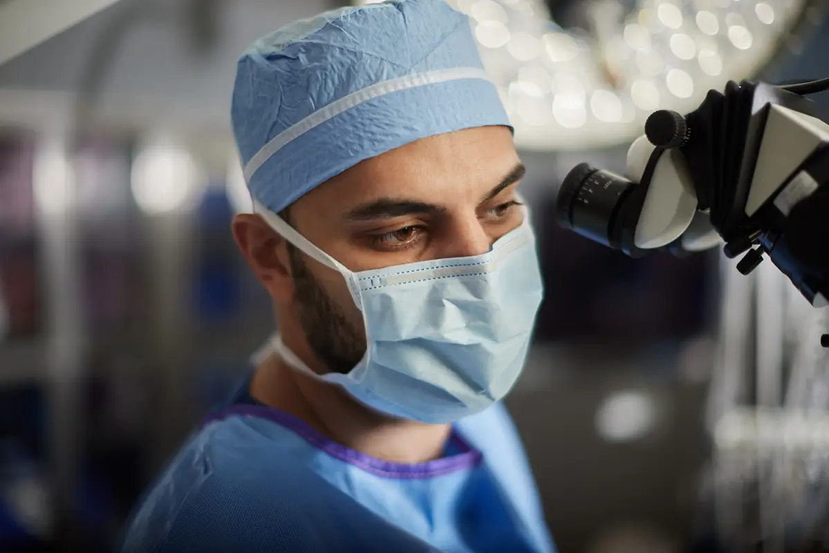 Dr. Mohammed Faraz Khan, spine specialist, consulting with a patient